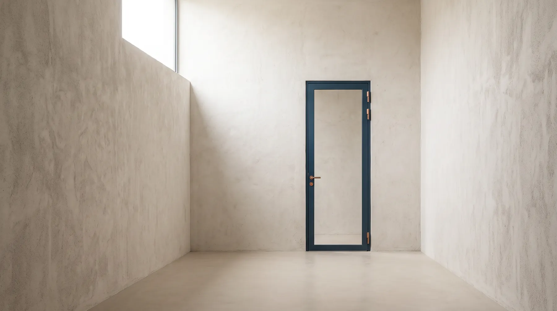 An empty limestone-plastered room with a single mineral-blue steel door fitted with copper hinges and a copper handle.